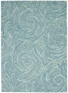 a blue rug with swirls on it