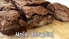 chocolate brownies cut in half on top of a wooden cutting board with the words mochi brownies