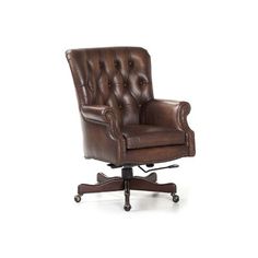 a brown leather office chair sitting on top of a wooden desk