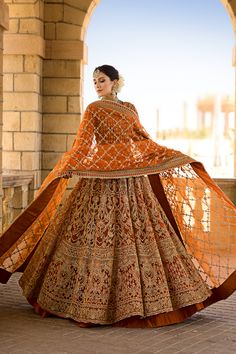 Orange Lehenga Choli and Dupatta Pakistani Bridal Dress is a traditional attire that will give you a head-turning dreamy look on the big day. Tilla, sequins, and goldwork give a glamorous touch to this perfectly stitched Bridal Lehenga Choli in premium quality fabric. Bridal Choli: The choli in an alluring orange shade has premium fabric. This beautiful choli is adorned with hand-crafted details of zardosi, sequins, and tilla. Naqshi and goldwork give a graceful finishing look to this choli, mak Orange Lehenga, Chic Prom Dresses, Bridal Dupatta