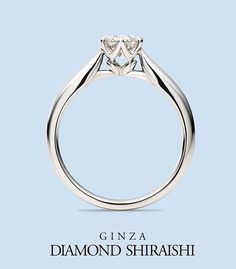 a diamond ring with the words ginza diamonds shirashi on it's side