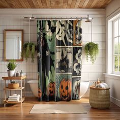 a bathroom decorated with halloween themed shower curtains