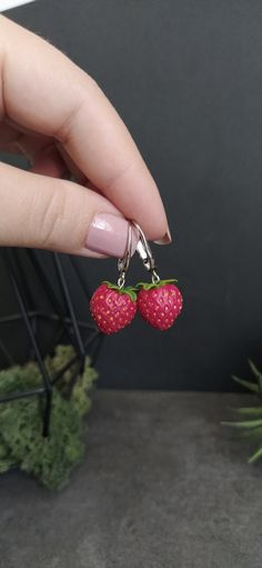 Strawberry earrings, Red jewelry, Fruit earrings, Nature jewelry, Cute gift for her, Berry earrings Price per 1 pair Size: Berry - 0.6 *0.6 inch (1.6 *1.6 cm) Earring length - 1.4 inches (3.6 cm) Material: Polymer Clay All details are handmade by me with love. Please note! Colors may differ depending on the settings of your monitor Thank you for your visit ) Dangle Clip-on Earrings For Valentine's Day Gift, Valentine's Day Gift Dangle Clip-on Earrings, Valentine's Day Gift Drop Clip-on Earrings, Cute Clip-on Drop Earrings For Gift, Red Drop Clip-on Earrings As Gift, Red Drop Clip-on Earrings For Gift, Cute Handmade Earrings For Anniversary, Hypoallergenic Dangle Clip-on Earrings For Gift, Hypoallergenic Drop Clip-on Earrings For Gift