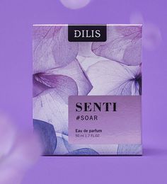 a purple box with white flowers on it and the words senti soar written in black