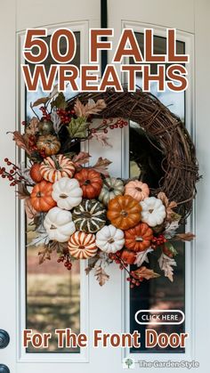 the front door is decorated with pumpkins, leaves and other decorations for fall wreaths