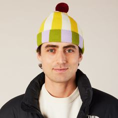 MoMA Exclusive: From everyone's favorite color specialist, designer Ellen Van Dusen, comes this cozy cotton beanie that packs a big style statement. Sporting Dusen Dusen's famous color combinations in vibrant stripes�and a pom-pom�this beanie is a great way to level-up any fall or winter look. One size fits most. Machine-wash cold, tumble dry low.Shop the matching Dusen Dusen Reversible Striped Cotton Scarf, sold separately here. Fall Green Cotton Hat, Retro Winter Beanie, Trendy Multicolor Winter Beanie, Warm Cotton Playful Hat, Warm Playful Cotton Hat, Playful Warm Cotton Hat, Playful Cotton Winter Hat, Green Cotton Beanie Cap, Fun Cotton Beanie Hat