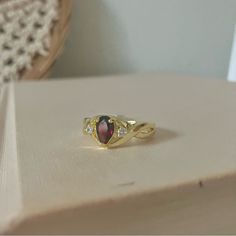 Nwt Pear Garnet Gold Promise Engagement Ring “Scarlette” Red Coffin Teardrop Jewelry Condition: New With Tags. Details: Lovely Costume Jewelry Ring In Gold Tone (Metal Is Untested And Unmarked), With Twisting Shanks Around A Pear Shaped Garnet, Accented With Clear Stones, Approximately Size 7.75 (Tag Is Marked As An 8). Elegant And Classic, A Perfect Promise Ring. Tested Center Stone In The Garnet/Tourmaline/Iolite Range On A Presidium Gem Tester. The Names In Quotations Of Titles Are Part Of My Deep Red Jewelry, Gothic Garnet Ring, Garnet Jewelry Aesthetic, Elegant Red Marquise Ruby Ring, Red Teardrop Ruby Ring For Gift, Elegant Pear-shaped Ruby Ring Gift, Classic Teardrop Ruby Ring For Gift, Classic Red Teardrop Ring, Elegant Teardrop Ruby Ring For Formal Occasions