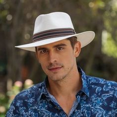 Man wearing white straw panama hat with red and navy band Boho Hat Outfit, Pomona California