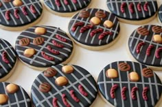 decorated cookies are arranged in the shape of grills