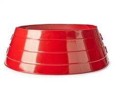 a red plastic bowl on a white background with clippings to the bottom and sides