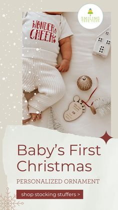 the baby's first christmas personalized ornament is shown in red and white