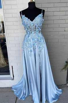 Gorgeous light blue satin A-line long formal dress features spaghetti straps, v neck, 3D flowers and low back. 2022 light blue satin A-line prom dress. Silk And Lace Prom Dress, Prom Gowns 2023, Blue Tool Dresses, Prom Dresses 2023 Baby Blue, Light Blue Prom Dress Flowers, Long Light Blue Prom Dress, Dusty Blue Prom Dress Long, Satin Wedding Dress With 3d Flowers, Baby Blue Long Prom Dress