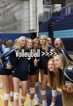 the volleyball team is posing for a photo in front of an arrow that says volleyball