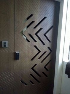 a door with an arrow design on it