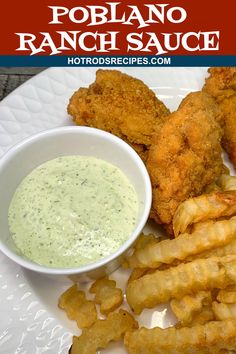 fried fish and chips on a white plate with ranch sauce