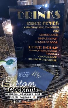 the drink menu for drinks is displayed on a table