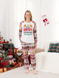 Celebrate Christmas in style with our matching family pajamas. The design features Santa's cookies, gingerbread men, and the hashtag #noregrets, adding a fun and festive touch to your holiday wardrobe.
* Please add each size separately to your shopping cart
* Each size includes 1 set of pajamas (1 top+1 bottom), or 1 romper, or 1 pet bandana.
* For children's safety, pajamas should be snug-fitting or flame-resistant. These kids' and babies' pajamas are flame-resistant.
* Pajama pants feature drawstring waist and pockets
* Crew neck
* Long sleeves
* Suitable for home, leisure, and Christmas
* Moderate length
* Imported and supplied by PatPat
* Product design: matching family pajamas with Santa's cookies, gingerbread men, and hashtag #noregrets Gingerbread Man Pattern, Pattern Pajamas, Christmas Pajamas Family, Cookies Gingerbread, Santa Cookies, Pajamas Sets, Christmas Pjs, Matching Family Pajamas, Gingerbread Men