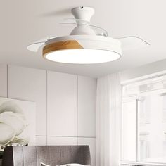 Elevate your space with the Invisible Blades Ceiling Fan. Its modern and minimalistic design seamlessly integrates into any room, adding a touch of sophistication. 
 Experience optimal comfort with the fan's invisible blades, providing effective air circulation without compromising style. Enjoy a cool and refreshing environment. 
 The integrated LED light enhances both functionality and ambiance. Illuminate your space with adjustable brightness to suit different occasions. 
 Choose from five dif Professional Electrician, Fluorescent Tube, Live Fit, Fan With Light, Wood Shades, Luminous Colours, Lamp Bulb, Room Dimensions, Fashion Lighting