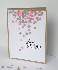 a birthday card with confetti on it