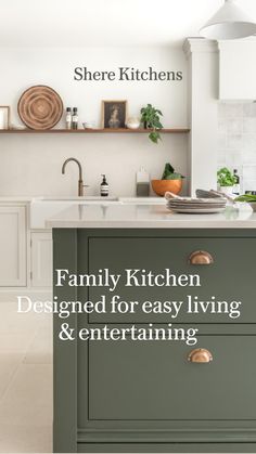 a kitchen with green cabinets and white counter tops