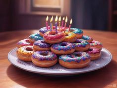 there are many donuts with candles in the middle of them and sprinkles on top