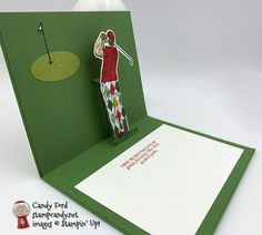 a card with a golf player on it