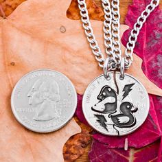 These necklaces features a baby panda and baby duck with lightning strikes engraved next to them on each interlocking side. They are cut by hand to fit together perfectly. We deeply engrave the inside details of the duck and panda. It is made from a US coin.We now have new real silver quarters that are new and in mint condition! These are specialty coins that the mint has made for collectors that have never been in circulation. Our art is really enhanced by using these beautiful silver coins. Yo Couples Jewelry, Silver Quarters, Lightning Strike, Baby Duck, Bff Necklaces, Quarter Dollar, Best Friend Jewelry, Relationship Gifts, Baby Ducks