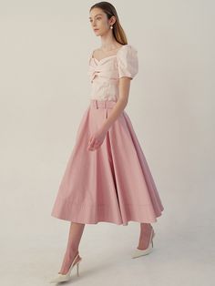 This is a comfortable and trendy skirt by BAU by Bride And You that is made out of high quality cotton and nylon blend fabric. It gives a feminine and romantic mood to your daily outfit - Vent detail on the hem- Side pockets detail- Belt included- Back zipper closure Feminine Relaxed Mini Skirt, Feminine Midi Skirt, Chic Pink Cotton Skirt, Feminine Midi Skirt With Voluminous Fit, Feminine Full Pleated Skirt, Chic Knee-length Cotton Skirt, Feminine Relaxed Skirt For Daywear, Feminine Pleated Skirt, Feminine Relaxed Fit Skirt For Daywear