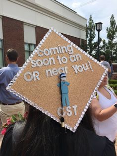 a graduation cap that says coming soon to an or near you