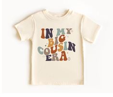 Cute and funny toddler big cousin t-shirt that makes a perfect gift for a cousin-to-be or pregnancy announcement. ♥PRODUCTION TIME: 1-5 days (Usually 2-3 days) ♥SHIPPING TIME: 2-5 days (Usually 3 days) ♥PRODUCT DESCRIPTION: Bella Canvas 3001 T-shirt Super soft cotton and excellent quality print makes. 100% Soft cotton (fiber content may vary for different colors) Light fabric (4.2 oz/yd² (142 g/m Runs true to size Our Relaxed Fit Tee (Bella Canvas 3001) is a relaxed fit and is soft and cozy. * F Cousin Pregnancy Announcement, Big Cousin Announcement, Promoted To Big Cousin, Big Cousin Shirt, Cousin Crew Shirts, Cousin Shirts, Funny Toddler, Cousin Gifts, Cousin Crew