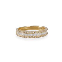 an 18k gold band with baguettes and diamonds