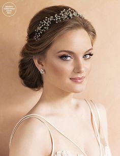 a woman wearing a tiara on top of her head