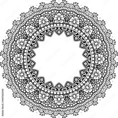 an intricate circular design in black and white