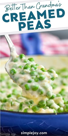 a blue bowl filled with peas and cream