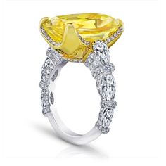 20.26 carat Cushion Yellow Sapphire with pear shape, marquise and brilliant round diamonds 3.63 carats set in a platinum with 18k yellow gold ring Bling Engagement Ring, Fancy Yellow Diamond Ring, Yellow Sapphire Ring, Fancy Diamond Ring, Yellow Diamond Ring, Yellow Sapphire Rings, Unique Diamond Engagement Rings, Yellow Diamond Rings, Yellow Jewelry