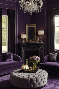 a living room with purple furniture and chandelier