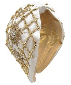 Off white Linen fabric headband with gold beads in a cross hatch/ diamond studded pattern Measurements (approximate): 3" x 6.5" Materials: Linen like Fabric and Agate Beads Adjustable Gold Headband For Festive Occasions, Adjustable Gold Headband With Structured Crown, White Beaded Headband Jewelry, Traditional Adjustable Gold Headband, Gold Adjustable Headband With Teardrop Crown, Adjustable Gold Beaded Headpieces, Adjustable White Beaded Headpiece, Elegant Handmade Gold Headband, Elegant Gold Handmade Headband