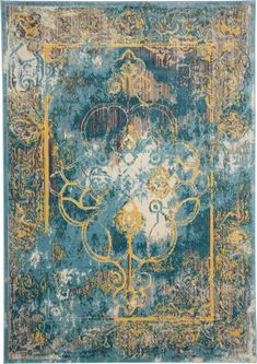 a blue and yellow rug with an ornate design