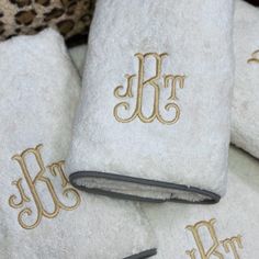 towels with gold monogrammed initials on them