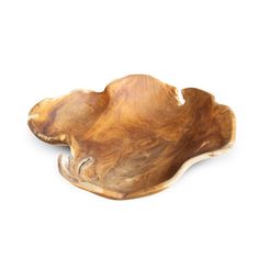 a wooden bowl sitting on top of a white surface