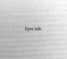 an open book with the words eyes talk written in black ink on top of it