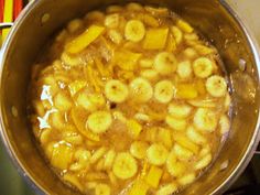 bananas are being cooked in a pot on the stove