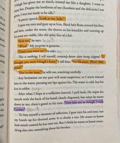 an open book with yellow and purple text on it