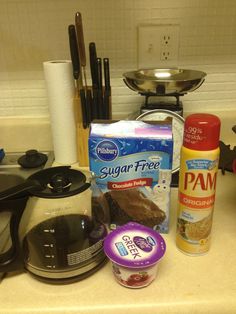 ingredients to make chocolate cake sitting on the counter