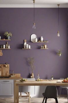 a dining room with purple walls and wooden tables in the center, along with shelves on the wall