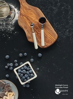 blueberries, bananas and other foods on a table