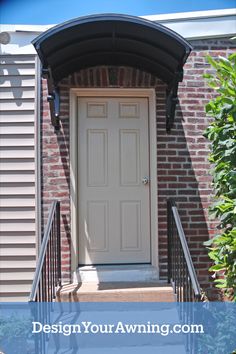 a front door with the words design your awning com on it and below it