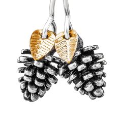 Introducing the Melanie Golden Artisan Jewelry Pinecone Earrings! These charming earrings are perfect for adding a touch of festive fun to your look this autumn and winter. They feature a tiny pinecone charm and a dainty leaf, both crafted from either silver or gold. Whether you're headed to a Halloween party, Thanksgiving feast, or Christmas gathering, these earrings are sure to put you in the holiday spirit! So go ahead and deck yourself out in all things merry and bright with the Melanie Gold Pinecone Earrings, Pinecone Necklace, Thanksgiving Jewelry, School Dinners, Christmas Gathering, Golden Jewelry, Handcrafted Artisan Jewelry, Holiday Jewelry, Christmas Earrings