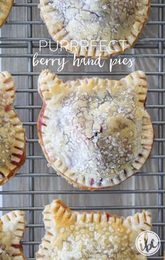 several different kinds of pies on a rack with the words, purpries berry hand pies