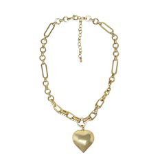 Add a charming touch to your outfit with our Encouraged Mini Bow Necklace! This dainty accessory features a mini bow and pearl, perfect for layering or wearing on its own. Cute and versatile, it's a must-have addition to any jewelry collection. Large Chain Heart Necklace 18k Gold Plated Over Brass 41 + 5 cm long Cubic Zirconium Detailing on Chain Extendable Lobster Clasp Metal Heart Necklace With Chunky Chain, Trendy Metal Heart Necklace With Chunky Chain, Chunky Heart Pendant Metal Chain Necklace, Trendy Gold Heart Charm Necklaces, Chunky Heart Pendant Chain Necklace In Metal, Chunky Chain Heart Pendant Necklace, Trendy Gold Heart Charm Necklace, Gold Chunky Heart-shaped Jewelry, Trendy Gold Heart Necklace With Adjustable Chain